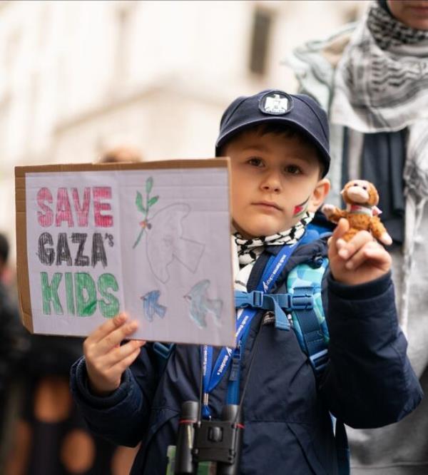 Parents and children lay out cuddly toys across the entrance to the Foreign Office in London, as they protest to save children's lives in Gaza. Each toy represents a Palestinian child killed during the Israel-Hamas conflict. 