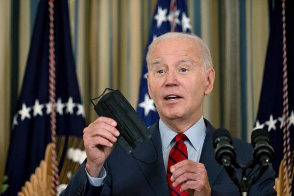 Biden laughs off Covid guidance, fails to mask up after wife tests positive