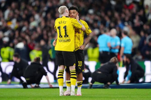 Borussia Dortmund's Marco Reus (left) and Jadon Sancho react after losing the final. Photo: Mike Egerton/PA Wire. 